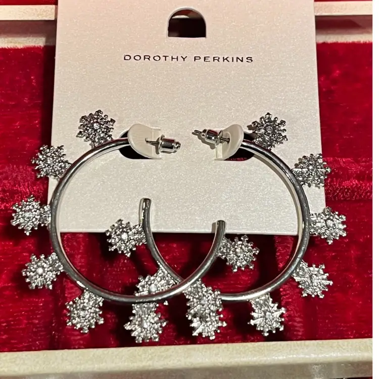 Dorothy Perkins silver-tone hoop earrings with crystal snowflake-shaped accents