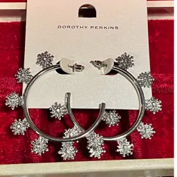 Dorothy Perkins silver-tone hoop earrings with crystal snowflake-shaped accents