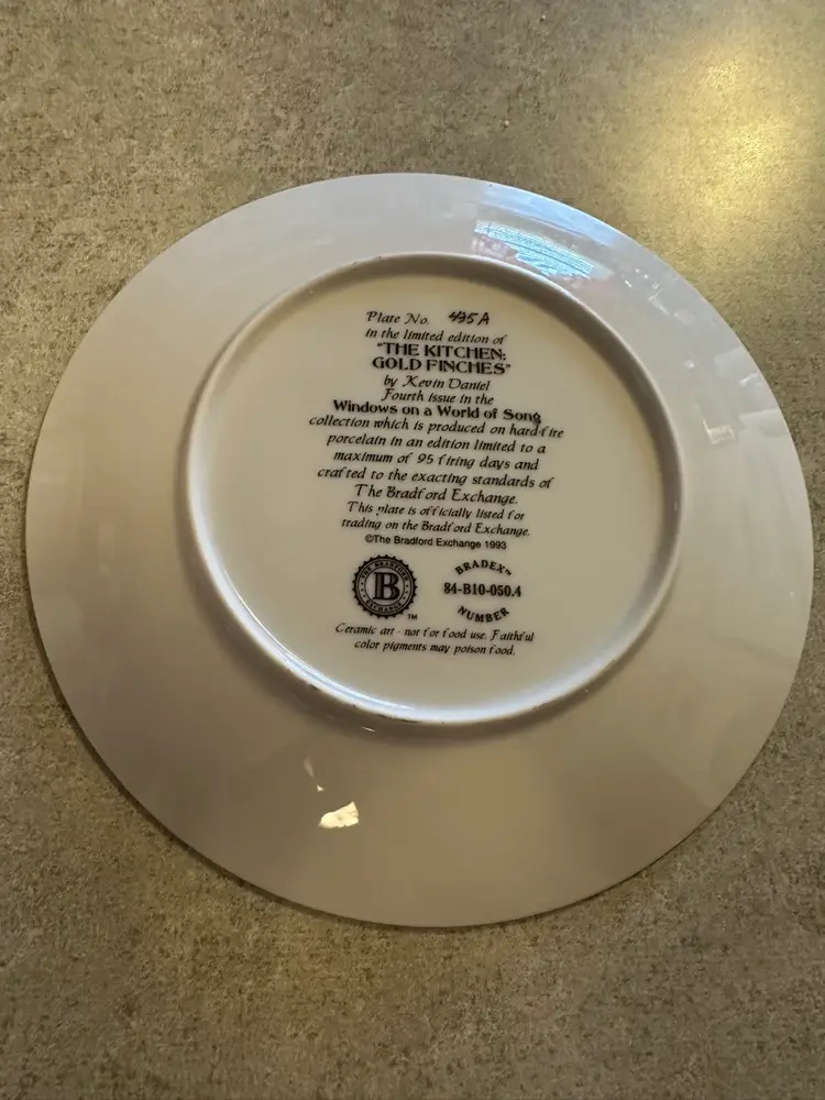 Porcelain collector plate titled 'The Kitchens; Gold Finches' by Kevin
Daniel