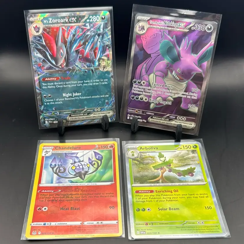 Pokémon Lot N’s Zoroark Ex, Team Rockets Nidoking Ex , Chandelure Holo, Arboliva Holo