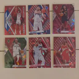 Lot of 12 red ice parallels from 2023-24 Panini Phoenix.