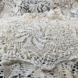 Two White Round Doilies