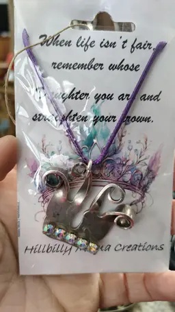 Purple cord crown pendant