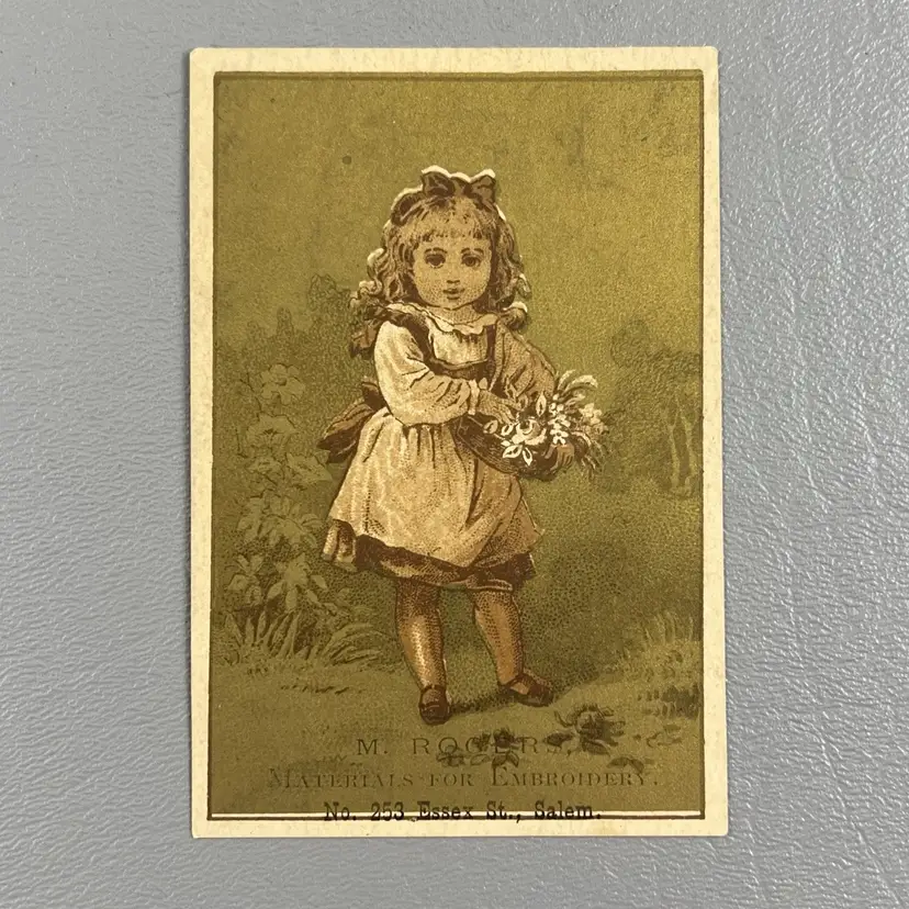 Victorian Trade Card Little Girl Gathering Flowers M Rogers Salem MA Embroidery Store