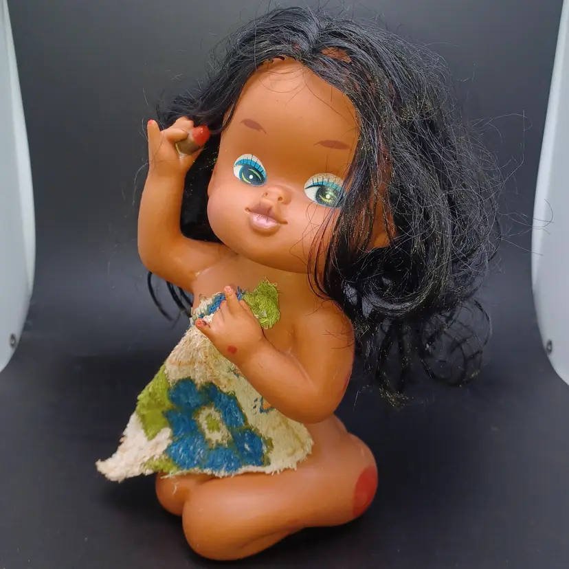 Vintage 1960s Hawaiian luau girl with lipstick in towel rubber toy figurine