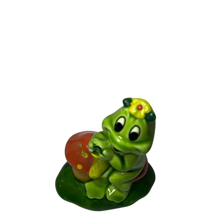 Vintage Lefton ceramic Frog Sitting On A Mushroom & Knitting.
Such A Colorful Figurine.
