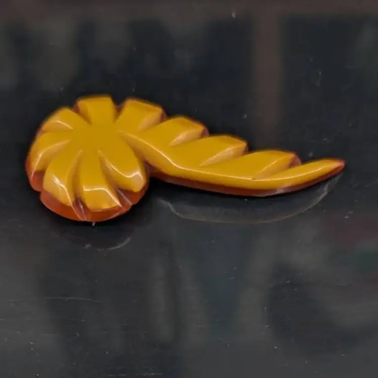 Vintage Laminated Bakelite Brooch in Butterscotch and Dark Red Deep Carved Swoop
