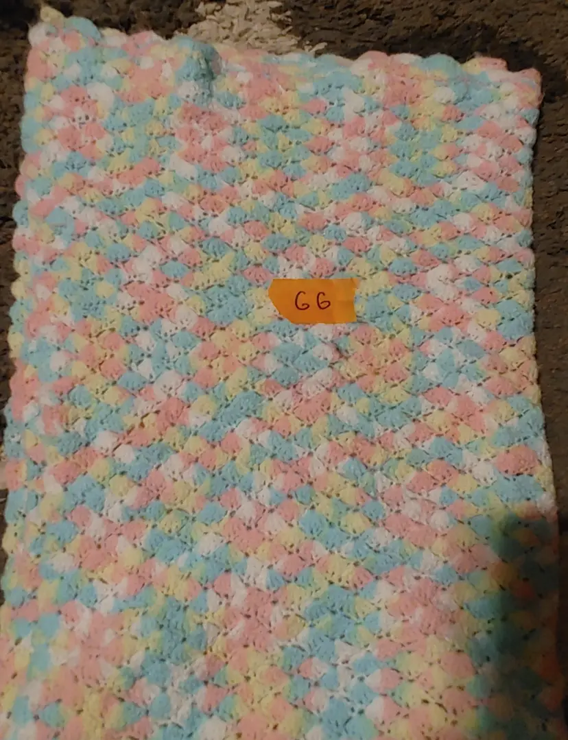 Afghan GG- approx size 27 x 42. Pastels. As shown.