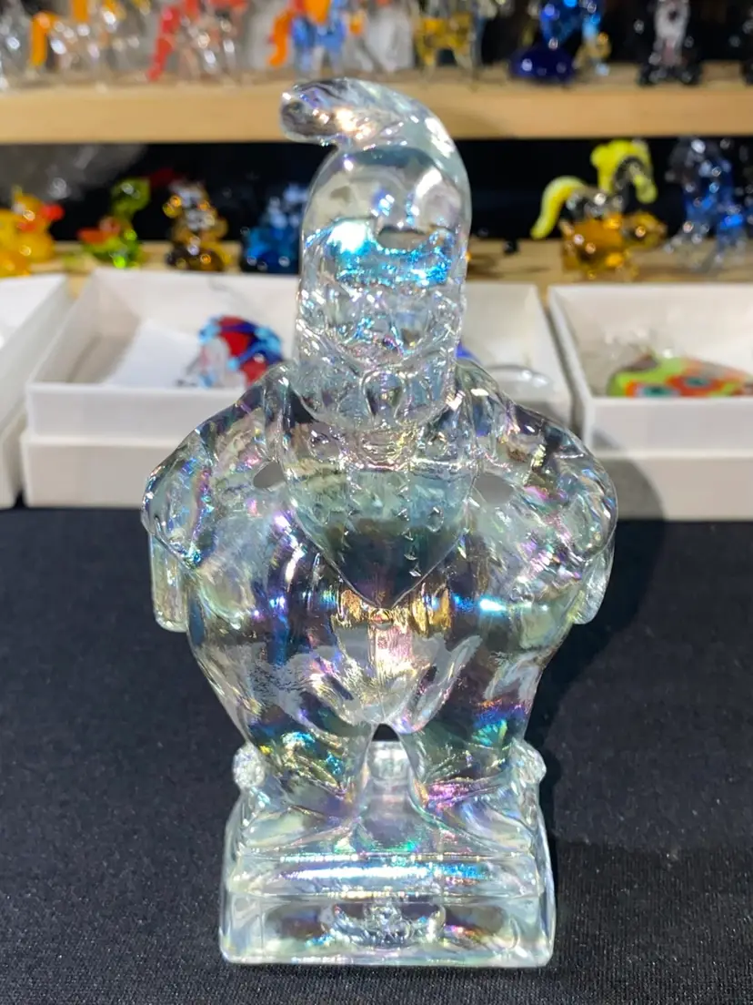 #01- Mosser Glass Co. This is part of the Series -  SO GLAD I FOUND YOU AT THE END OF THE RAINBOW - MINDY.  The Jester Style Clown is 4.75" Tall. He is a clear Clear With Iridescence color.