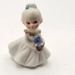 Porcelain Bisque Figurine Vintage girl with flowers