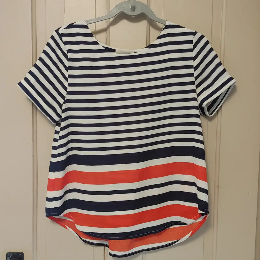 Top- Brand: Everly. Size Small. Navy, white, orange striped top. 70% Cotton, 30% Linen. No callouts.
