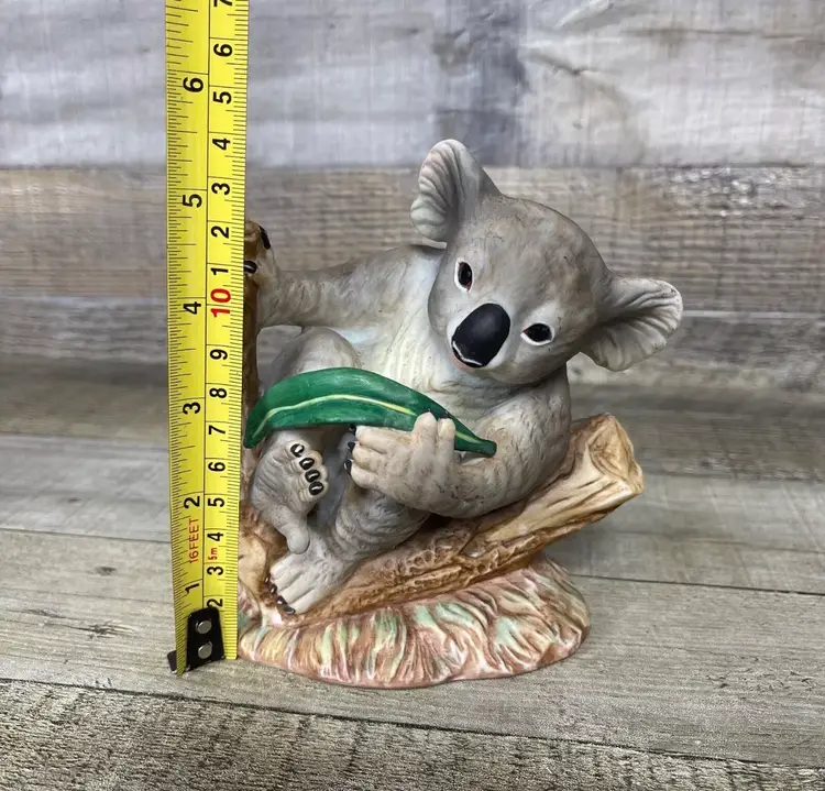 Koala Figure On Eucalyptus Branch
Porcelain Figurine Decor