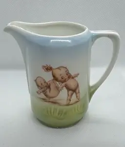 Vintage Prussia Royal Rudolstadt Rosie O’Neill Kewpie Creamer