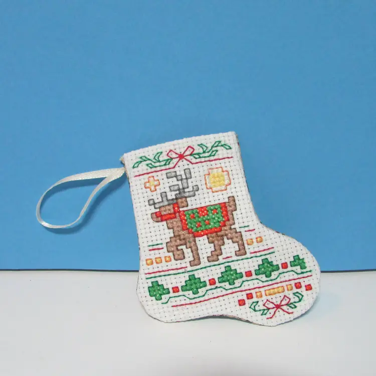 completed handmade cross stitch small Christmas stocking ornament reindeer