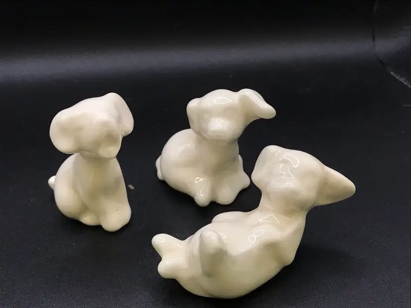 Trio of ceramic white pups #1