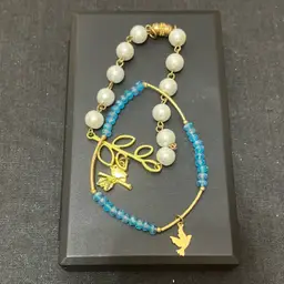 2 Goldtone Bird Bracelets