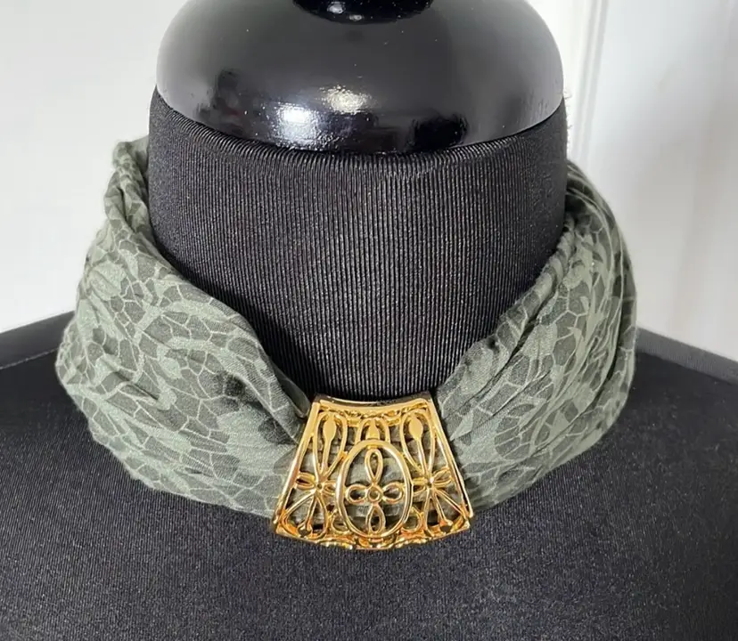 Rich gold tone, scarf slide. Versatile way to accessorize your attire!