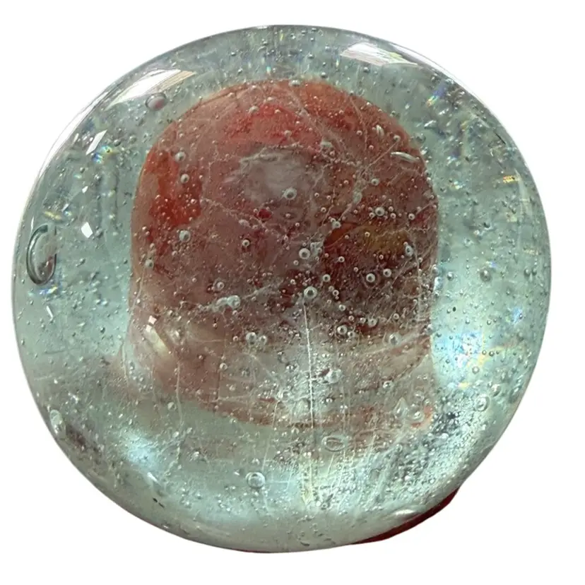 Hand blown glass paper, weight, messy, and strange