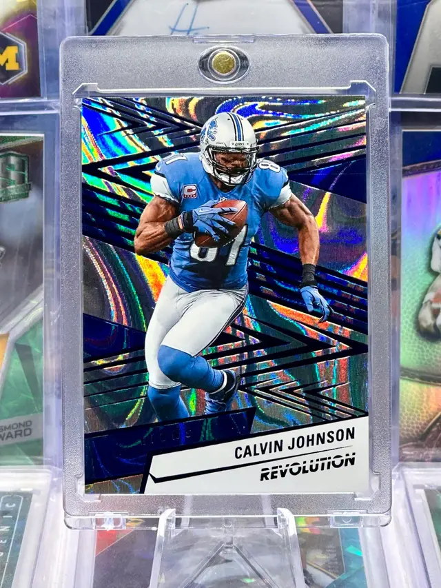 Calvin Johnson Jr. 2025 Revolution /99 COLOR MATCH Blue Swirl Lava Detroit Lions
