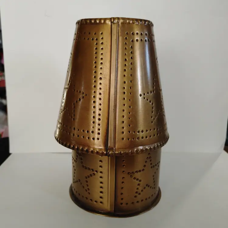Rustic Punched Tin Candle Holder. 8 inches high.