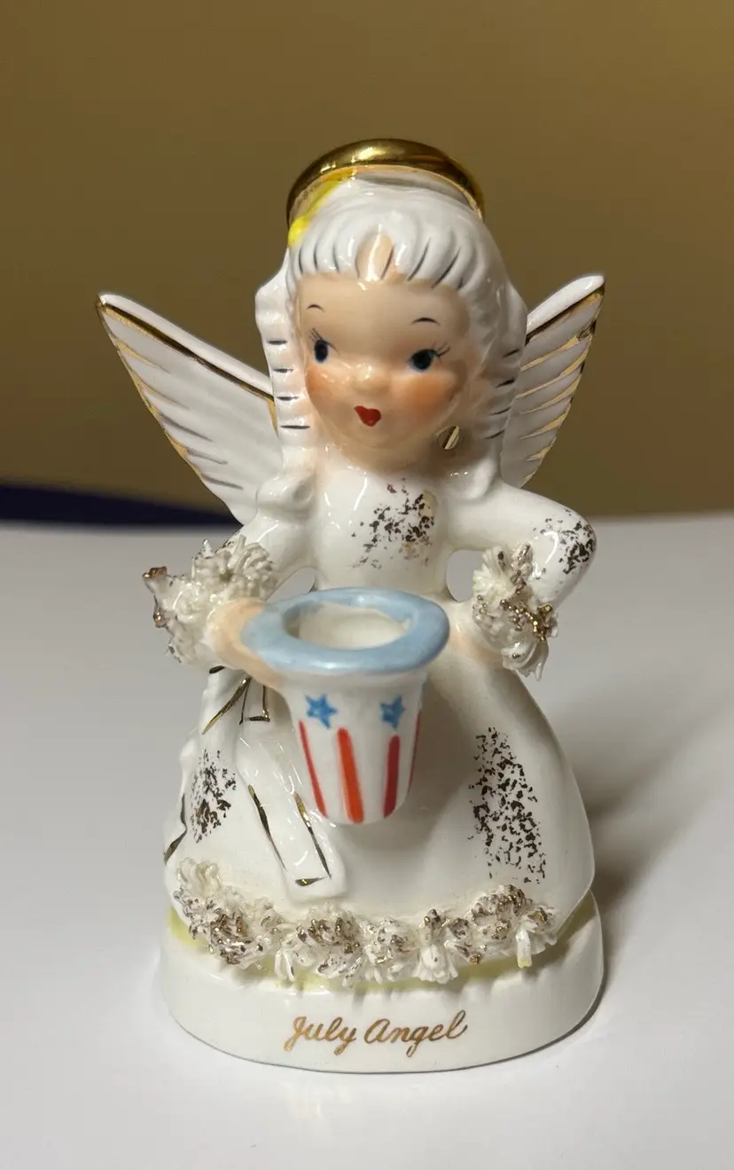 NAPCO July Birthday Angel 4.25” tall A1367
Red white blue gold spaghetti trim