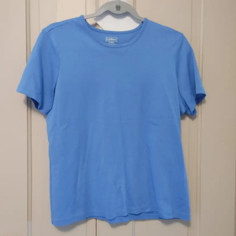 Top- Brand: L.L. Bean. Size Large. Sky blue top. Material- 100% supima cotton. No callouts.