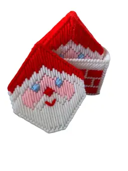 This is a set of vintage handmade plastic yarn Christmas Santa chimney coasters.