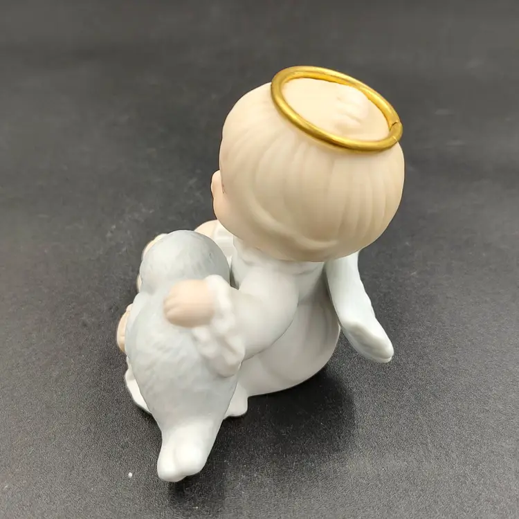 Vtg Enesco Holly Babes Angel With Baby Seal Figurine