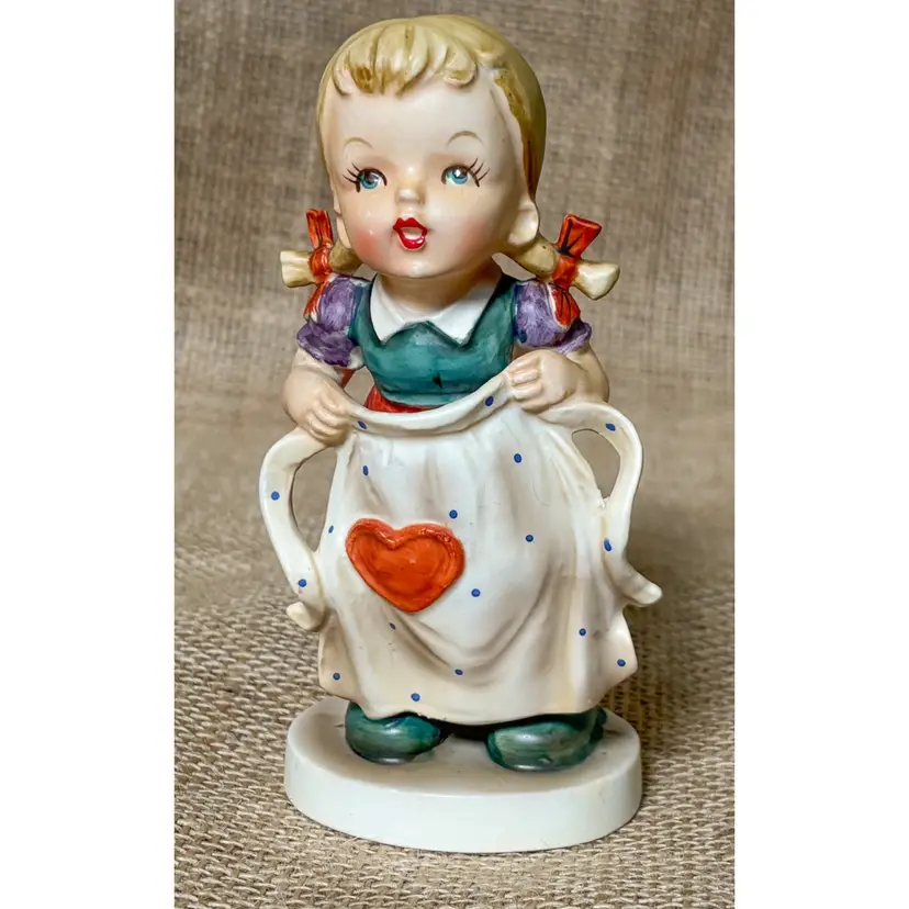 Vintage Mothers Helper Figurine Girl In Braids Holding Apron Porcelain Cottage