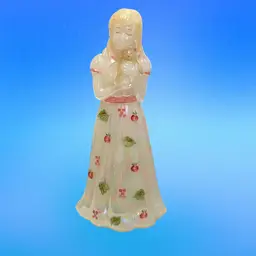 Fenton Little Sister Apple And Leaves Doll.