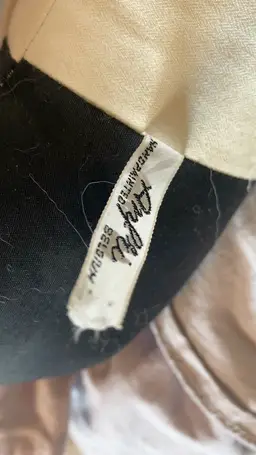 vintage ANFRI doll from Belgium, likely late 1950s to early 1970s. ANFRI (short for Annie & Frits, the founding family) was known for these soft sculpture cloth dolls with dreamy, hand-painted faces and theatrical costumes.