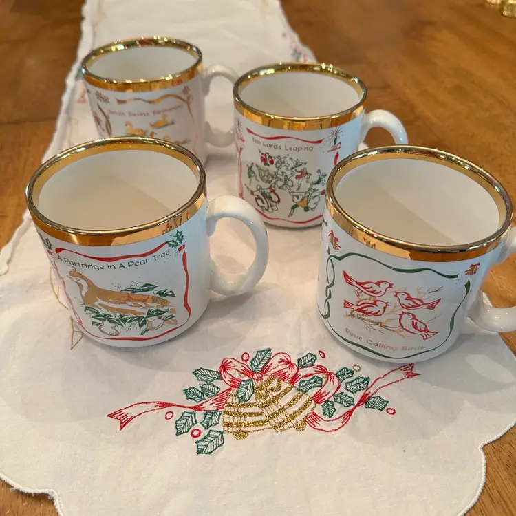 Beautiful Vintage Twelve Days of Christmas Mugs made in England By TAMS.  Features 3 Song Motifs on each mug with gold accents.  Perfect for Christmas Morning Brunch!