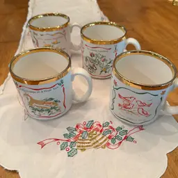 Beautiful Vintage Twelve Days of Christmas Mugs made in England By TAMS. Features 3 Song Motifs on each mug with gold accents. Perfect for Christmas Morning Brunch!