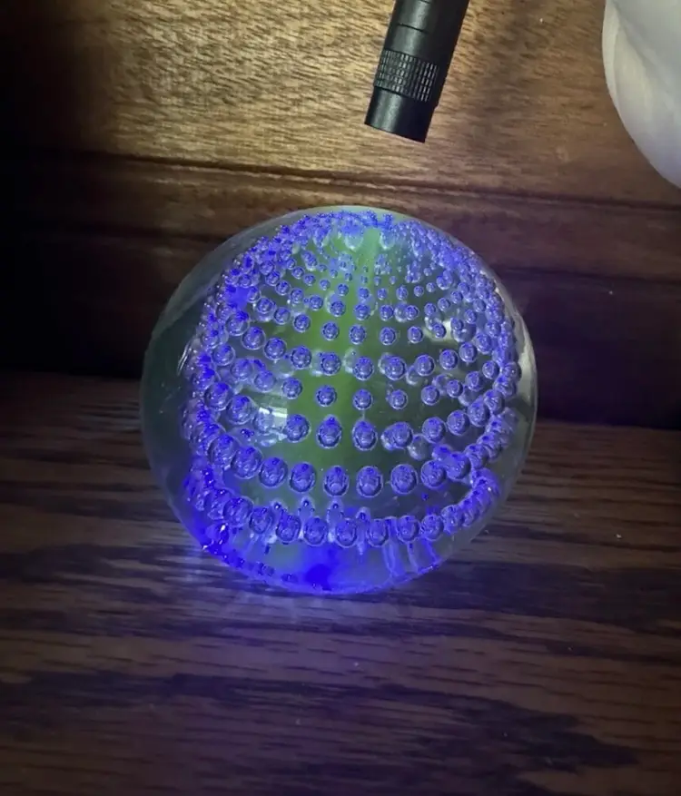 Clear glass paperweight controlled bubbles optical illusion uranium glass