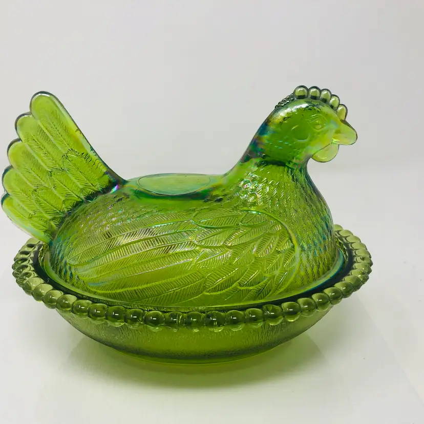 Mismatched Green Iridescent Indiana Glass Hen on a Plain Green Nest
