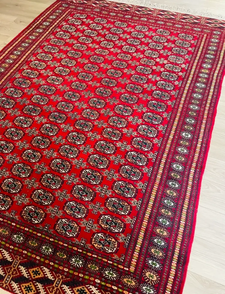 Vintage Bukhara Tekke Rug
6' x 9' Turkmenistan, Afghanistan, made in Pakistan