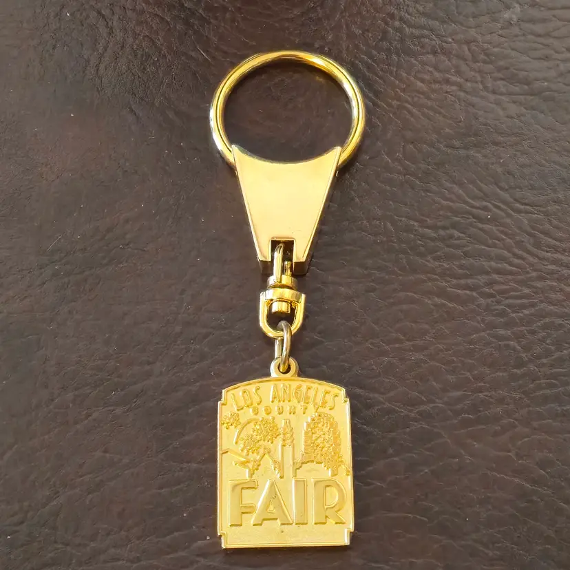 Souvenir Key Chain LOS ANGELES COUNTY FAIR Gold Color 4" Long with Issues Vintage