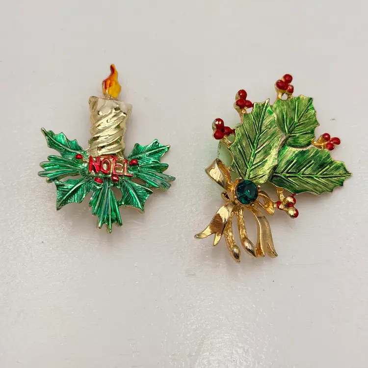 Pair Of Vintage Holiday Brooches Including Noel Candle And Rhinestone Leaf