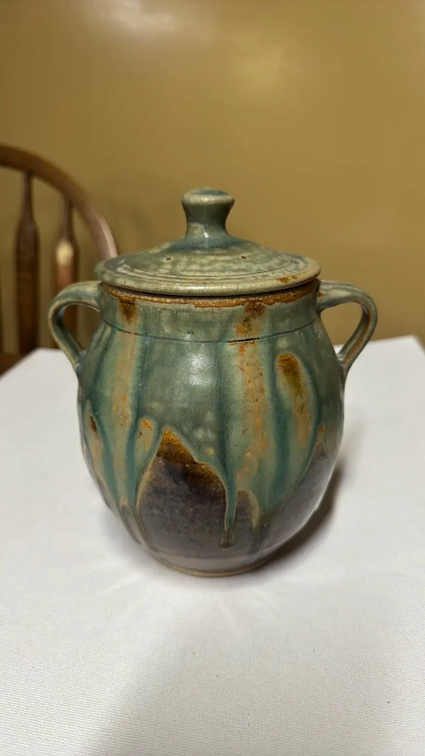 LoveJoy Stoneware Pottery Lidded Handled canister crock tan and green 7.25” tall