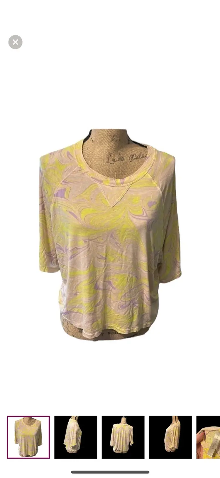 Fabletics flourescent yellow and purple swirls on a cream tee. NWOT.