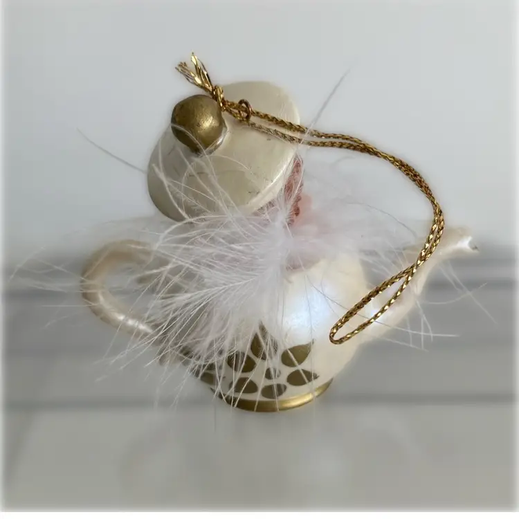 Adorable Little Girl In A Teacup Ornament