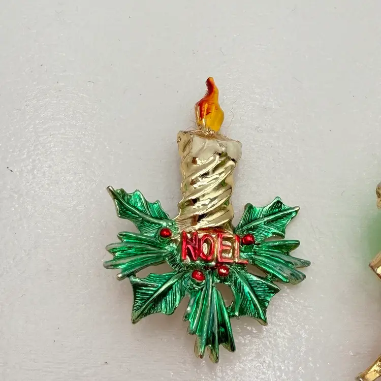 Pair Of Vintage Holiday Brooches Including Noel Candle And Rhinestone Leaf