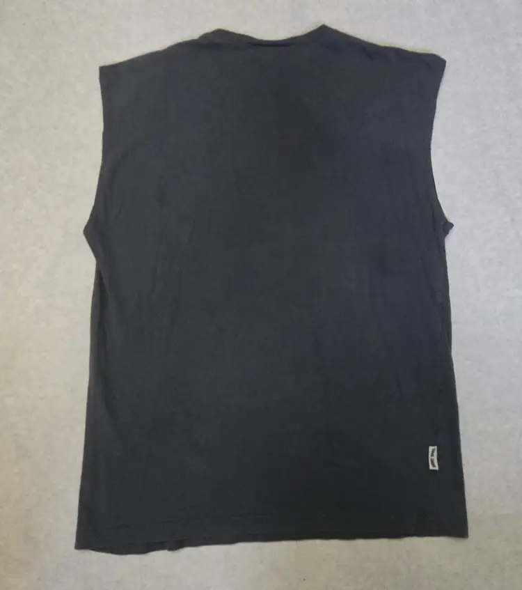 Looney Tunes Sleevless T-Shirt Mens L Black Sylvester and Tweety  Brand: Looney Tunes  Style: Men's Sleeveless   Style/Model code:   RN82871  Materials: Cotton  (per tag).  Country of origin: Sri Lanka.  Details: Gently Used. Shirt was altered with sleeves cut off making it sleeveless shirt.  Actual Measurements - Please see images of actual measurements to compare to your favorite brands   0041