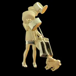 AJC Gold Tone Shopper Pin in Gold Tone With Packages and Dog