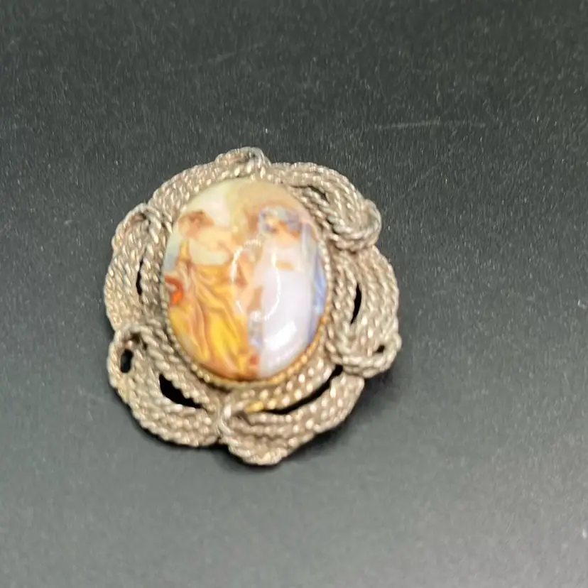 Figural Brooch, Patina Silvertone 1 3/4” High