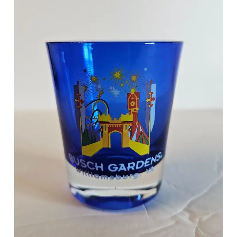 #01 - Two Busch Gardens Shot Glasses, One Cobalt and one Printed in 22K Gold by Culver, both 2.5" tall