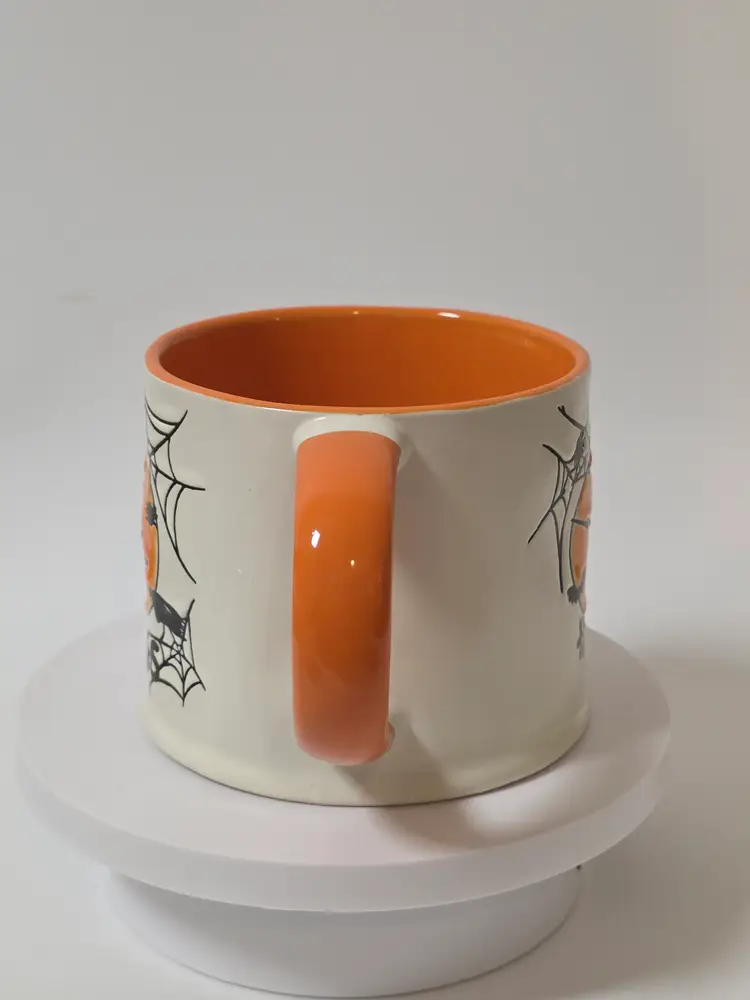 Eli and Ana Handmade Ceramics Hocus Pocus Mug Orange Black Halloween Witch Broom