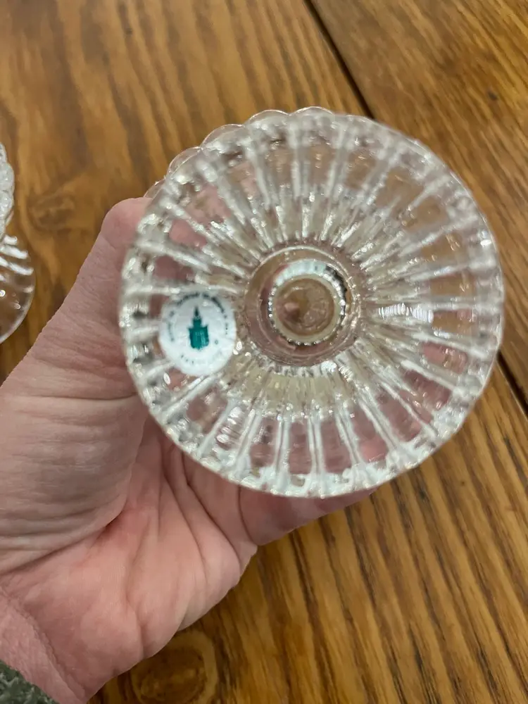 A pair of clear pressed glass votive Partylite candle holders with diamond patterns. 4” Tall - 
Can Be Used For Votives Or Tapers As The Top Section Is Removable From Base .