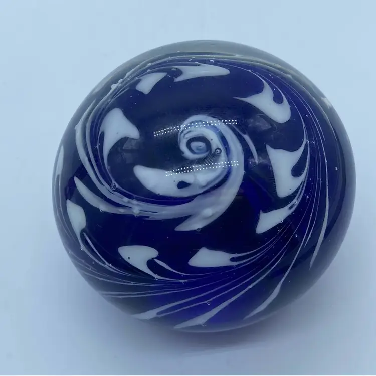 #0047 handblown cobalt blue and white swirl art glass paperweight.