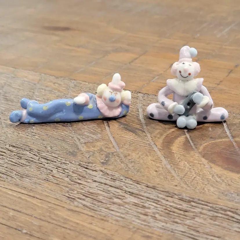 Set Of 2 Ceramic Small Whimsical Pastel Glazed Laying And Sitting Clown Figurines Unsigned